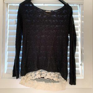 Black sweater with lace hem design